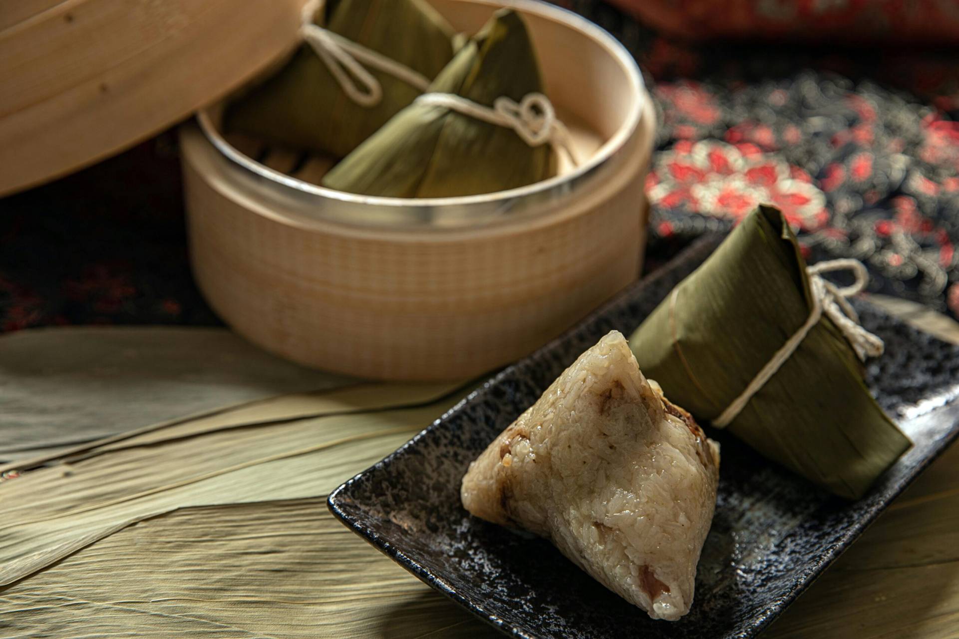 Delicious Taiwanese zongzi wrapped in bamboo leaves, showcasing traditional culinary craftsmanship.